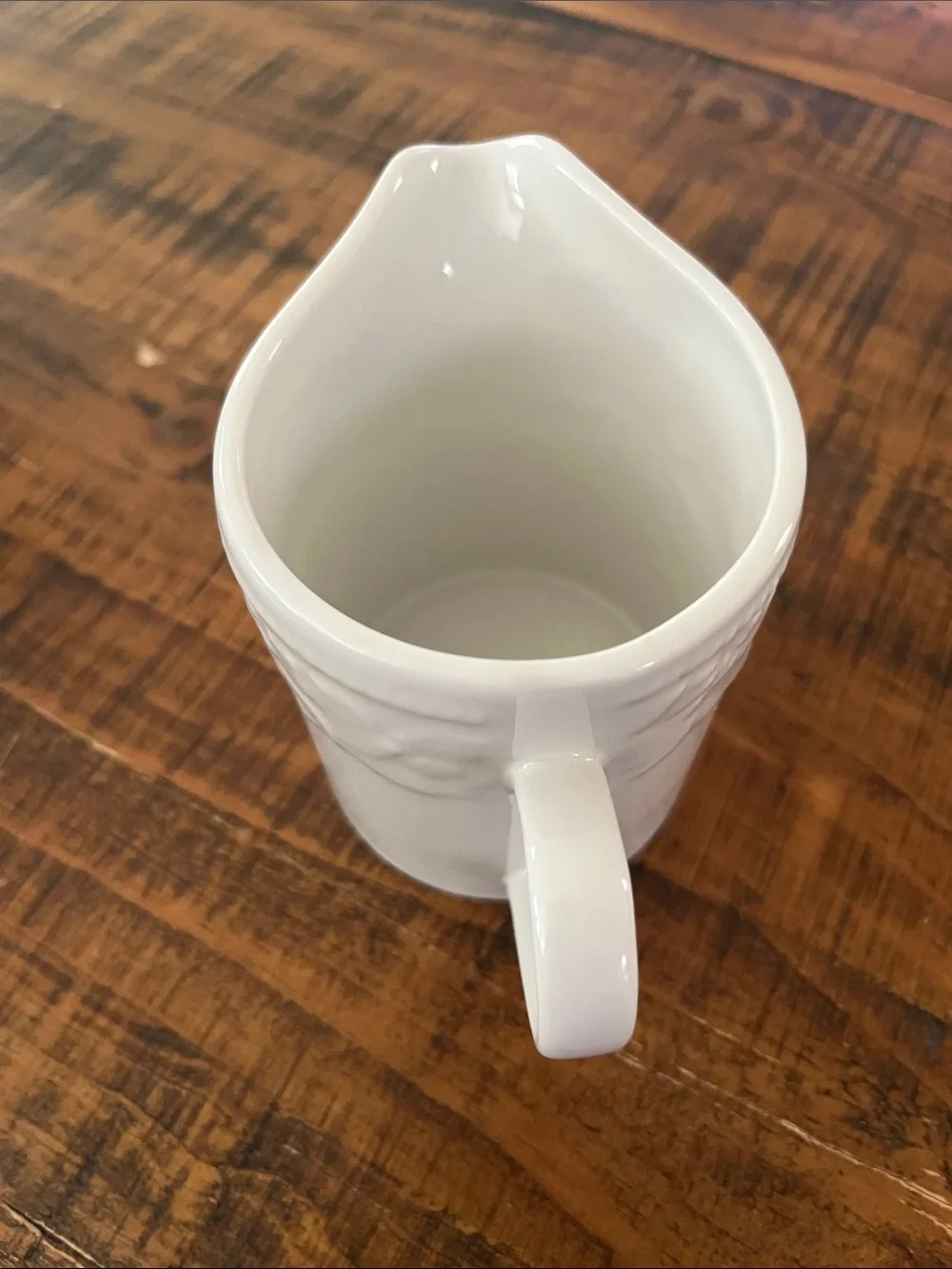 Classic White Ceramic Creamer with Embossed Detail